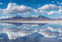 With every step the reflection on Salar de Uyuni shifts and changes ...